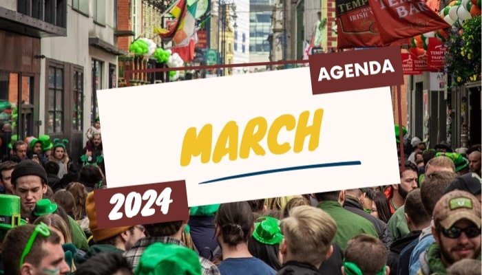 A crowd of people wearing green St Patricks Day costumes on Temple Bar with AGENDA MARCH 2024 written on top