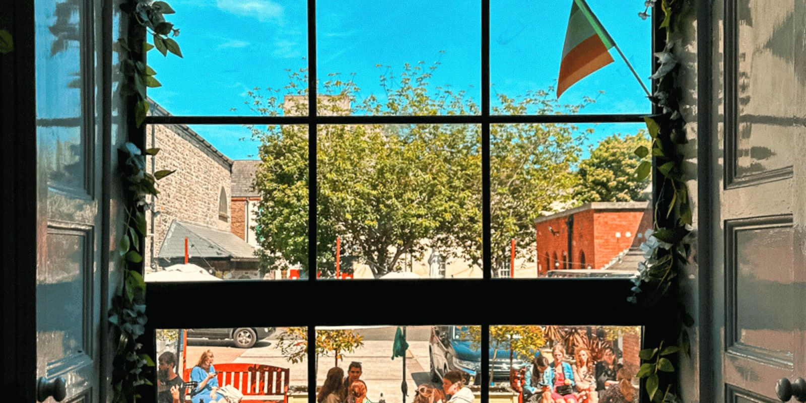 Guests Enjoying the Backyard - Garden at Gardiner House Hostel in Dublin