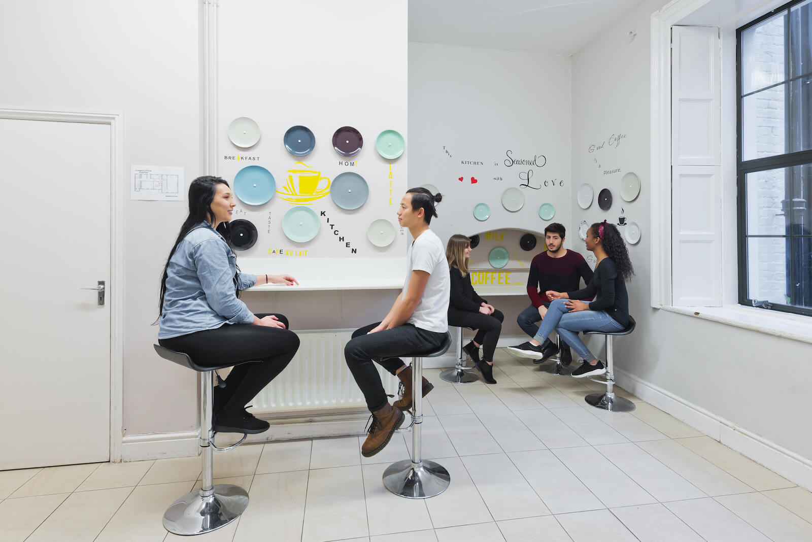 Guests enjoying some time together at Gardiner House Hostel in Dublin