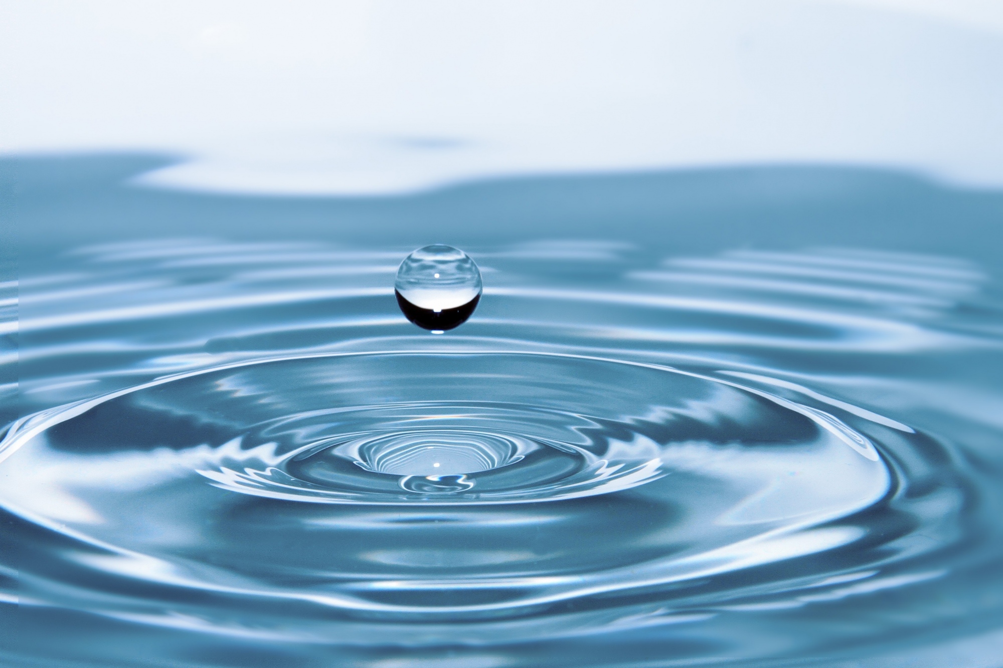 Water drop falling in the ocean